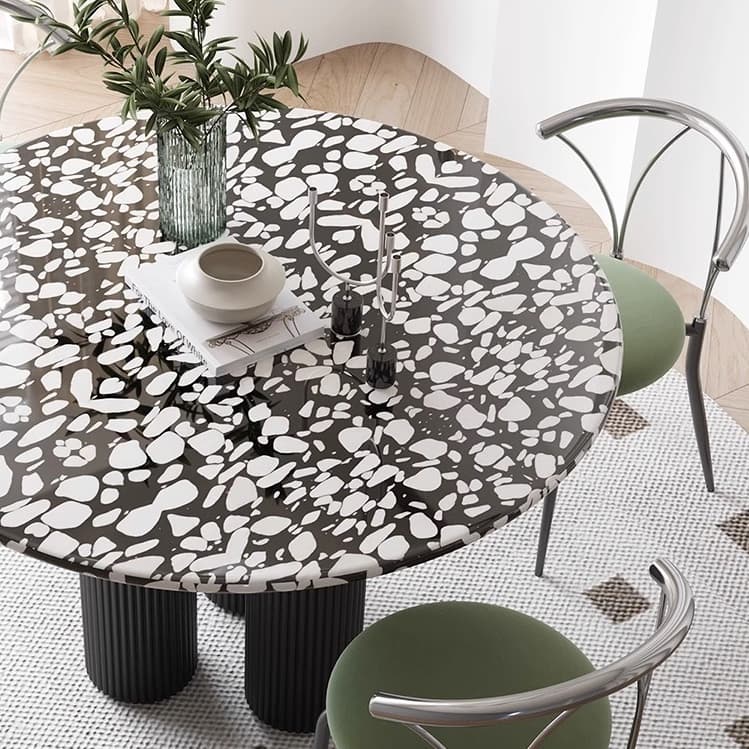 Modern dining table and chairs in a bright furniture showroom
